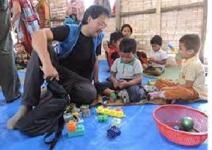 Seriously concerned about the future of millions of children: UNICEF representative Hozumi visiting a school