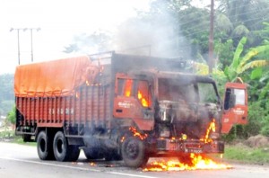 When trucks defy the roadblocks and get caught: torched by bandh enforcers in Saptari